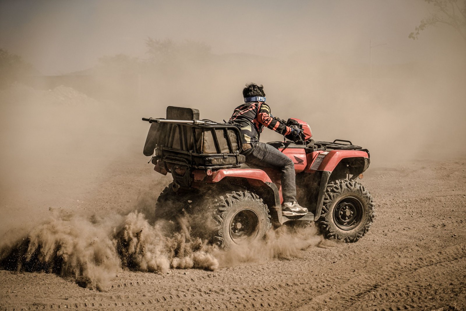 Self-Drive Quad Bike Power Drifting inside Deep Sand Bowl
