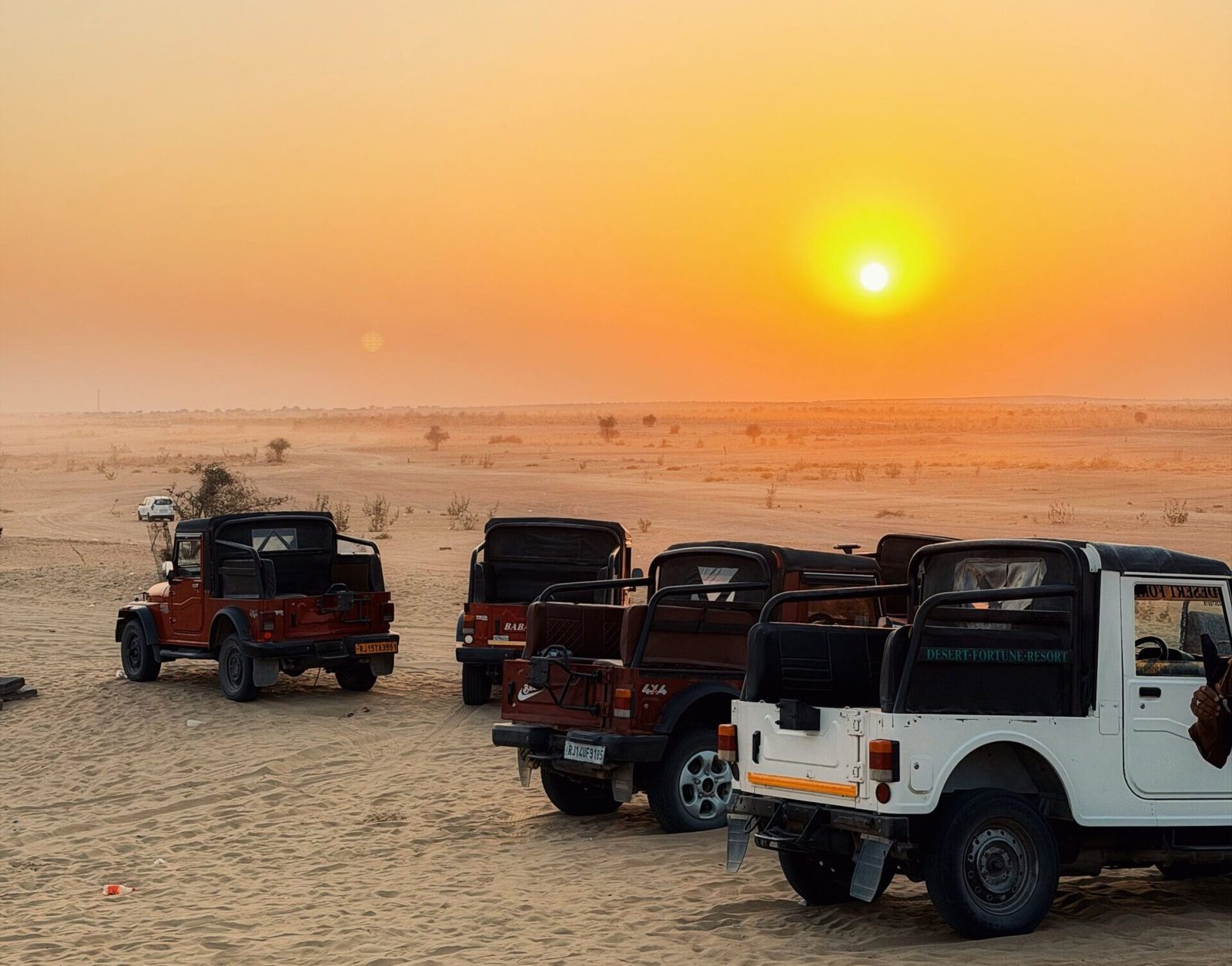 Open-Top 4x4 Thar Parked on Sunset Dune Plateau in Jaisalmer