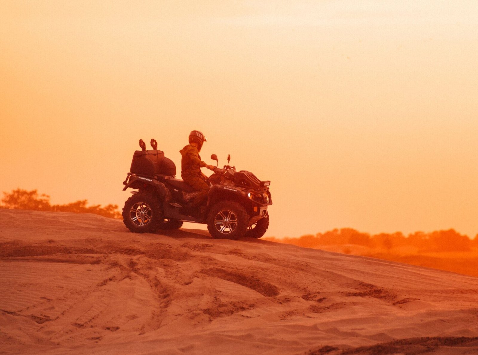 Quad Bike Parked on Sunset Dune Plateau for Golden Hour Photography